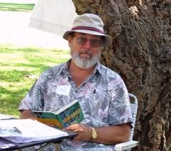 Rick Wagner sitting under a tree at a park in Long Beach, California